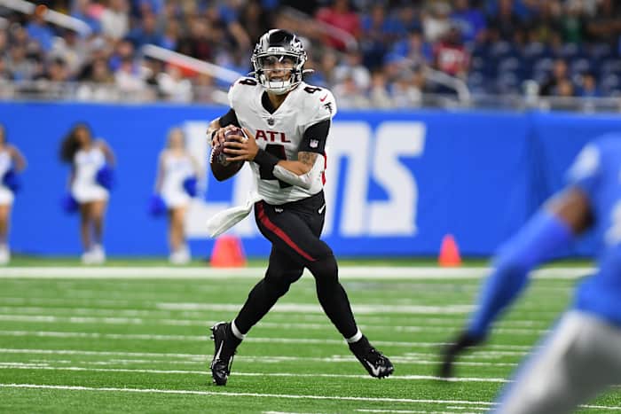 Aug 12, 2022; Detroit, Michigan, USA; Atlanta Falcons quarterback Desmond Ridder (4) looks for an open receiver against the Detroit Lions in the second quarter at Ford Field. Mandatory Credit: Lon Horwedel-USA TODAY Sports